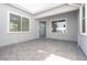Private outdoor patio with gray brick flooring and stucco wall finish at 852 W Golden Ore Pass, Apache Junction, AZ 85120
