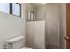 Tiled bathroom with a glass-enclosed shower and modern fixtures at 9243 W Kimberly Way, Peoria, AZ 85382