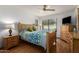 Bright bedroom with wood flooring, ceiling fan and outside view at 9243 W Kimberly Way, Peoria, AZ 85382