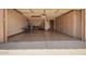 Spacious garage with built-in cabinets and plenty of room for storage at 9243 W Kimberly Way, Peoria, AZ 85382