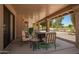 Covered patio with comfortable seating and golf course views at 9243 W Kimberly Way, Peoria, AZ 85382