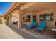 Covered patio with patio furniture and view of the backyard at 9243 W Kimberly Way, Peoria, AZ 85382