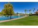 Picturesque pond with fountain feature on The Lakes Golf Course in a meticulously maintained community at 9243 W Kimberly Way, Peoria, AZ 85382