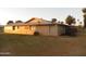 Exterior view of the home showing the brick and outdoor desert landscaping at 9426 N 109 Th Dr, Sun City, AZ 85351