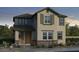 Charming two-story home featuring a stylish facade and well-manicured landscaping, creating great curb appeal at 9964 W Piccadilly Rd, Avondale, AZ 85392