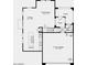 Open-concept floor plan showcasing the kitchen, dining area, great room and garage on the home's first floor at 9964 W Piccadilly Rd, Avondale, AZ 85392