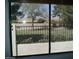 Tranquil backyard view with a fence, greenery, and trees providing privacy at , Mesa, AZ 85205