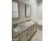 Bathroom with double sink vanity, granite countertops, and a shower-tub combo at , Mesa, AZ 85205
