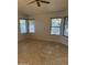 Bright bedroom with tile flooring, multiple windows, and natural light at , Mesa, AZ 85205