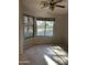 Bright bedroom with tile flooring, multiple windows, and natural light at , Mesa, AZ 85205
