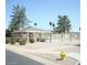 Community pool area with fenced enclosure and mature landscaping, offering a recreational space at , Mesa, AZ 85205