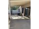 Covered patio with an AC unit and a view of the desert plants at , Mesa, AZ 85205