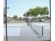 Community tennis court featuring a net and fencing at , Mesa, AZ 85205