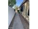 Exterior walkway view showing the side of the house at , Mesa, AZ 85205