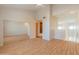 Second level bedroom features hardwood floors, high ceilings, and mirrored closet doors at 100 E Fillmore St # 227, Phoenix, AZ 85004
