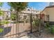 Secure gated community access with beautifully landscaped surroundings at 100 E Fillmore St # 227, Phoenix, AZ 85004