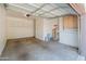 Well-lit garage with storage and ample space for vehicles and projects at 100 E Fillmore St # 227, Phoenix, AZ 85004