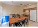 Recreation room kitchen area with a full sized refrigerator, sink and plenty of cabinet space at 100 E Fillmore St # 227, Phoenix, AZ 85004