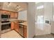 Stylish kitchen with stainless steel appliances, granite countertops, and an undermount sink at 100 E Fillmore St # 227, Phoenix, AZ 85004