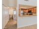 Open kitchen view featuring stainless steel appliances, granite countertops, and bar seating at 100 E Fillmore St # 227, Phoenix, AZ 85004