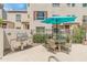 Poolside patio area with grill and table perfect for summertime entertaining and lounging at 100 E Fillmore St # 227, Phoenix, AZ 85004