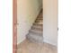 Carpeted staircase, providing access to the upper level of the home at 100 E Fillmore St # 227, Phoenix, AZ 85004
