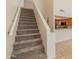 Carpeted staircase leading to the kitchen area at 100 E Fillmore St # 227, Phoenix, AZ 85004