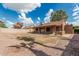 Expansive backyard with covered patio, perfect for outdoor entertaining and relaxation at 1110 E Utopia Rd, Phoenix, AZ 85024