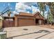 Desirable home with extended driveway, two-car garage, mature landscaping and privacy fence at 1110 E Utopia Rd, Phoenix, AZ 85024