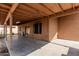 Covered patio with ample space and a connection to the backyard at 1110 E Utopia Rd, Phoenix, AZ 85024