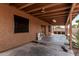 Covered patio with outdoor kitchen area and a ceiling fan for comfort at 1110 E Utopia Rd, Phoenix, AZ 85024