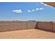 Backyard space with block wall and mountain views, offering privacy and potential for outdoor enjoyment at 1130 E Westwood Dr, Casa Grande, AZ 85122