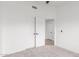 Bedroom with white walls, neutral carpet, and white doors at 13414 E Cindy St, Chandler, AZ 85225