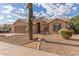 Beautiful home with desert landscaping including a cactus, neutral paint, and well-maintained curb appeal at 13414 E Cindy St, Chandler, AZ 85225