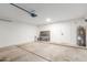Spacious garage with concrete flooring, water heater, and garage door opener at 13414 E Cindy St, Chandler, AZ 85225