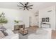Bright living room with modern decor, a comfortable sofa, and stylish seating, perfect for relaxing at 13414 E Cindy St, Chandler, AZ 85225