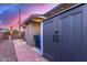 Backyard includes a brick walkway leading to outdoor storage solutions and utilities at 146 E 1St St, Mesa, AZ 85201
