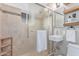 Stylish bathroom featuring a glass-enclosed shower, modern vanity, and sleek fixtures for a luxurious experience at 146 E 1St St, Mesa, AZ 85201