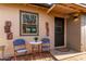 Inviting exterior with a cozy patio area featuring stylish outdoor seating at 146 E 1St St, Mesa, AZ 85201