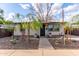 Charming home with modern xeriscaping, featuring gravel, unique succulents, and walkway at 146 E 1St St, Mesa, AZ 85201