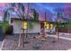 Charming single-story home featuring xeriscaped landscaping with cacti and rock ground cover at 146 E 1St St, Mesa, AZ 85201