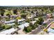 Aerial view of the neighborhood featuring lush landscaping and a community golf course at 14802 N 3Rd Ave, Phoenix, AZ 85023