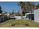 Lush backyard with a pool, hot tub, well-maintained lawn, and privacy fencing at 14802 N 3Rd Ave, Phoenix, AZ 85023
