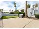 Serene backyard with a putting green, grill, and mature landscaping, offering a tranquil retreat at 14802 N 3Rd Ave, Phoenix, AZ 85023