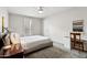 Bedroom featuring minimalist decor with a desk, chair and large window at 14802 N 3Rd Ave, Phoenix, AZ 85023