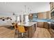 Bright kitchen with a center island, stainless steel appliances, and an open layout at 14802 N 3Rd Ave, Phoenix, AZ 85023