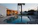 Backyard pool view showing outdoor seating and a covered patio area, perfect for lounging and enjoying the evening at 14802 N 3Rd Ave, Phoenix, AZ 85023