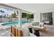Inviting poolside patio area with comfortable seating and a serene outdoor ambiance at 14802 N 3Rd Ave, Phoenix, AZ 85023