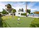 Beautiful backyard featuring a putting green and a view of the home's exterior at 14802 N 3Rd Ave, Phoenix, AZ 85023