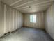 Bedroom space ready for customization, featuring natural light and flexible design at 15792 W Beryl Ave, Waddell, AZ 85355